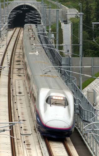 A Tohoku Shinkansen line Hayate train enters the Iwate Ichinohe Tunnel, Sept. 8, 2002
